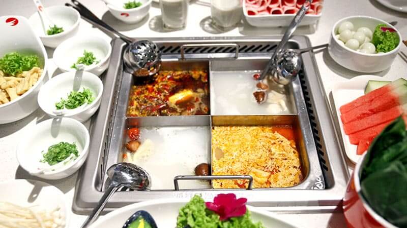 Chinese hot pot with four different tastes